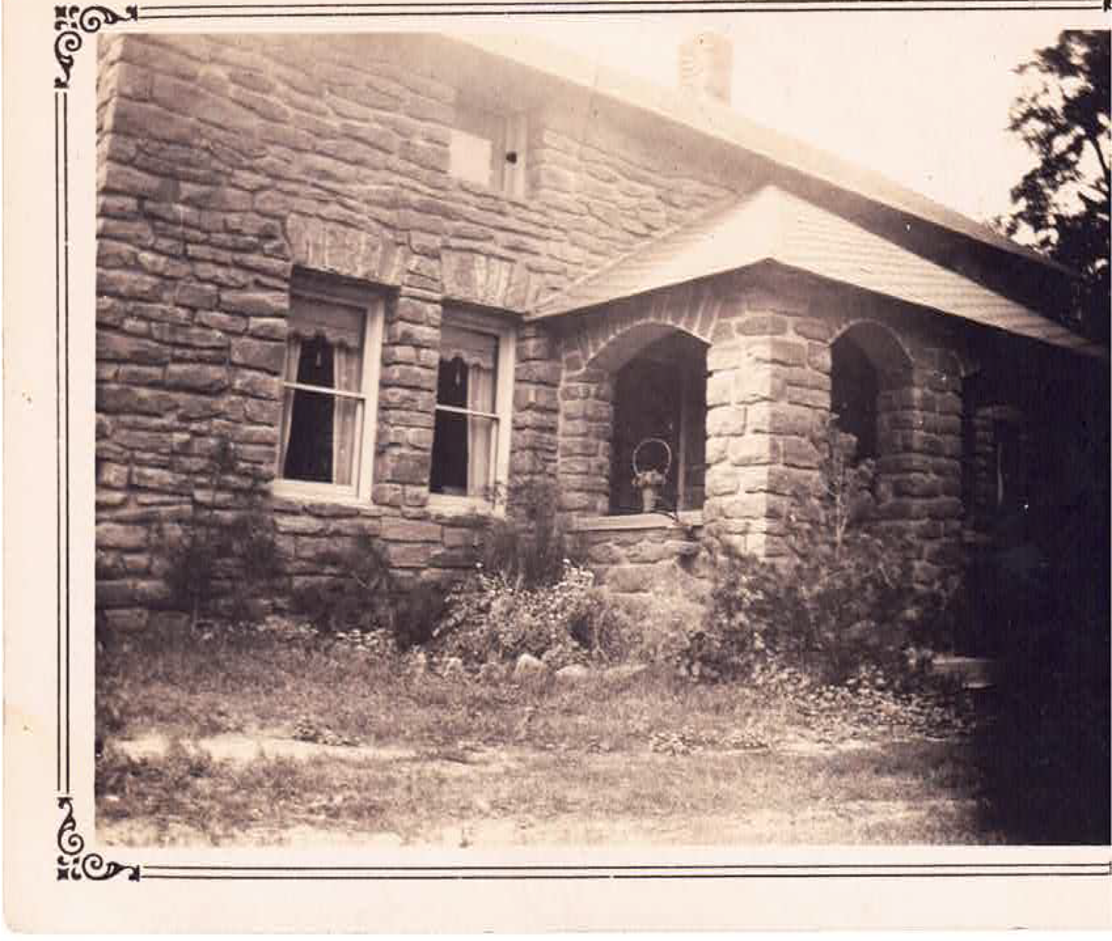 Historic photo of the limestone cottage
