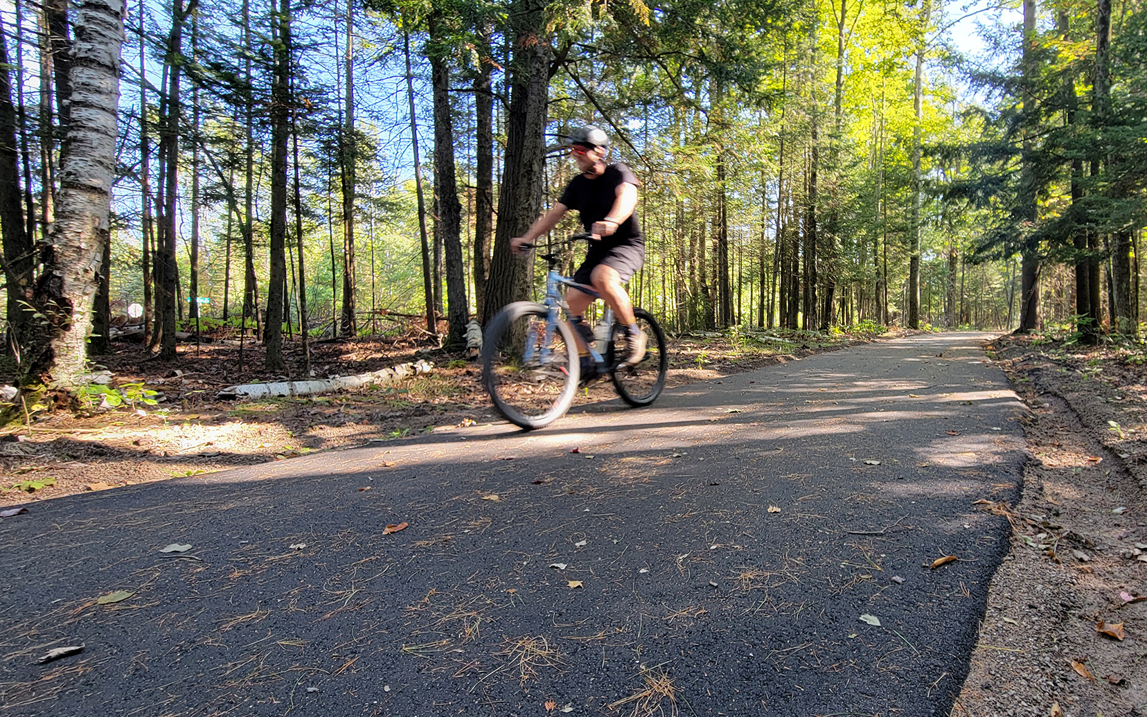Paving a new section of the Burt Lake Trail